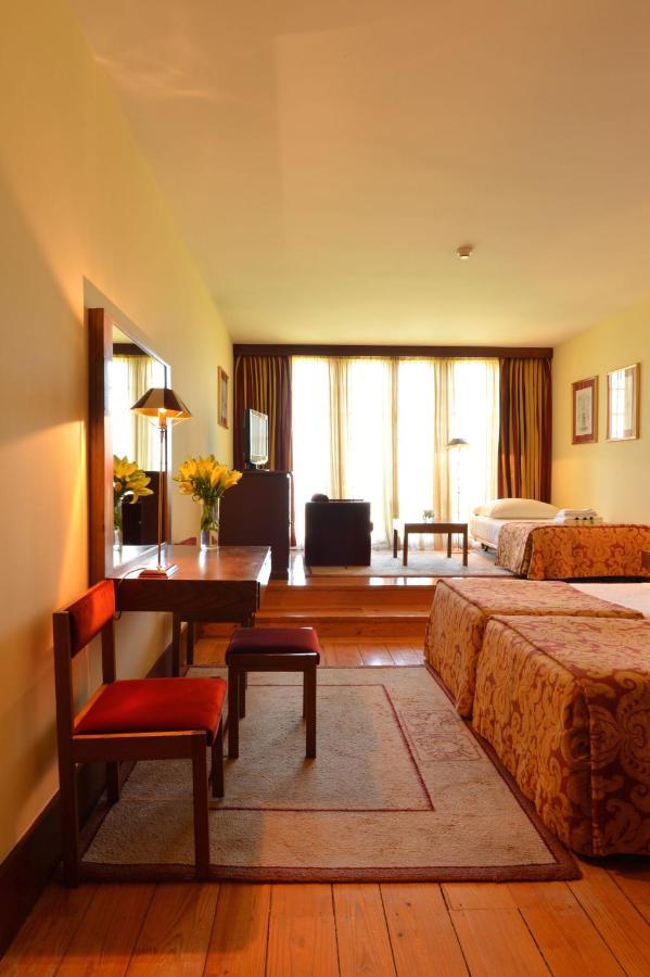 Pousada Mosteiro De Guimaraes Bagian luar foto A room at the hotel